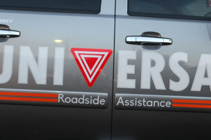 Close-up of Universal Roadside Assistance tow truck branding