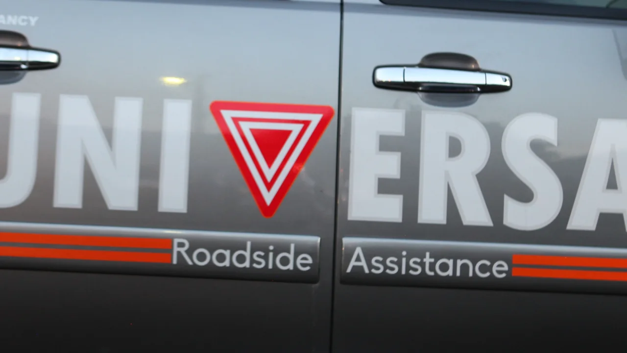 Universal Roadside Assistance branded tow truck